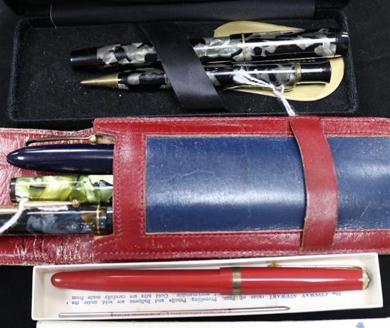 A Stewart Conway 286 clipless marbled pen/pencil set, a CS red pen (original box), a Swan Self-Filler and two other Swan pens